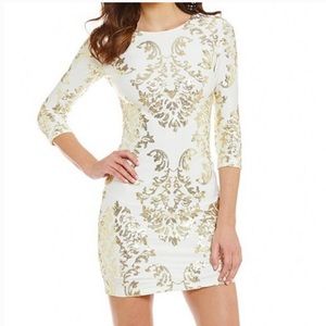 White with gold sequin dress